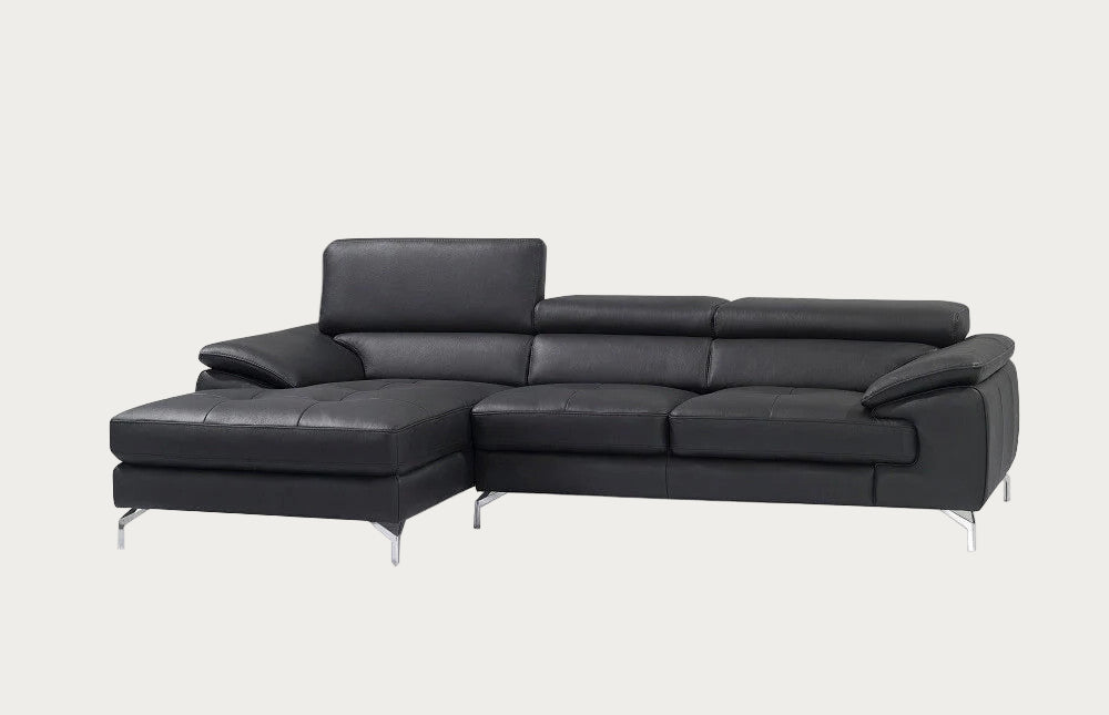 Black leather sectional sofa on a white background
