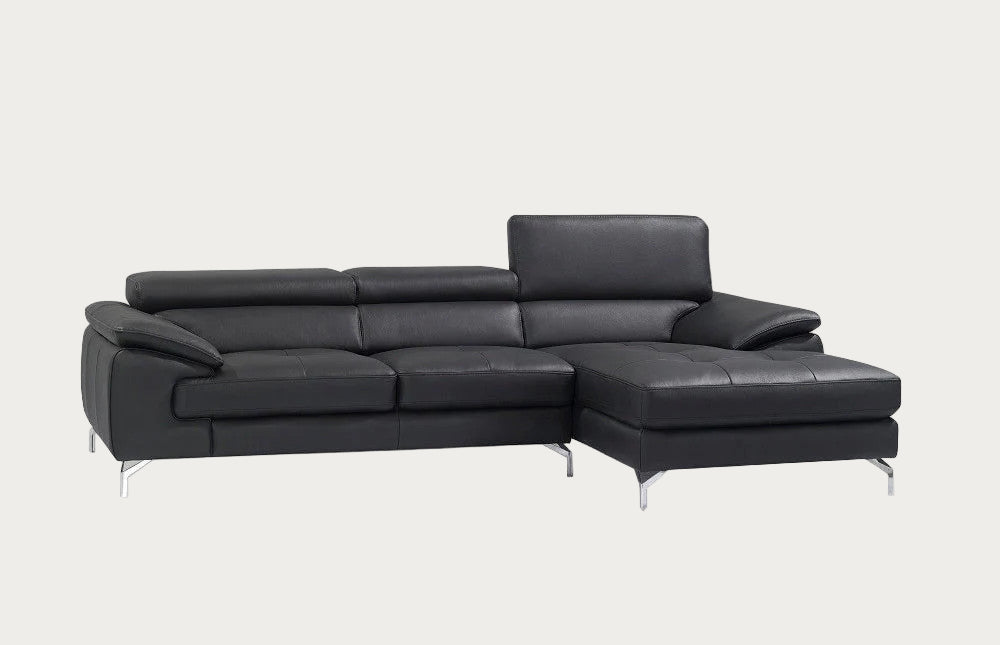 Black leather sectional sofa on a white background