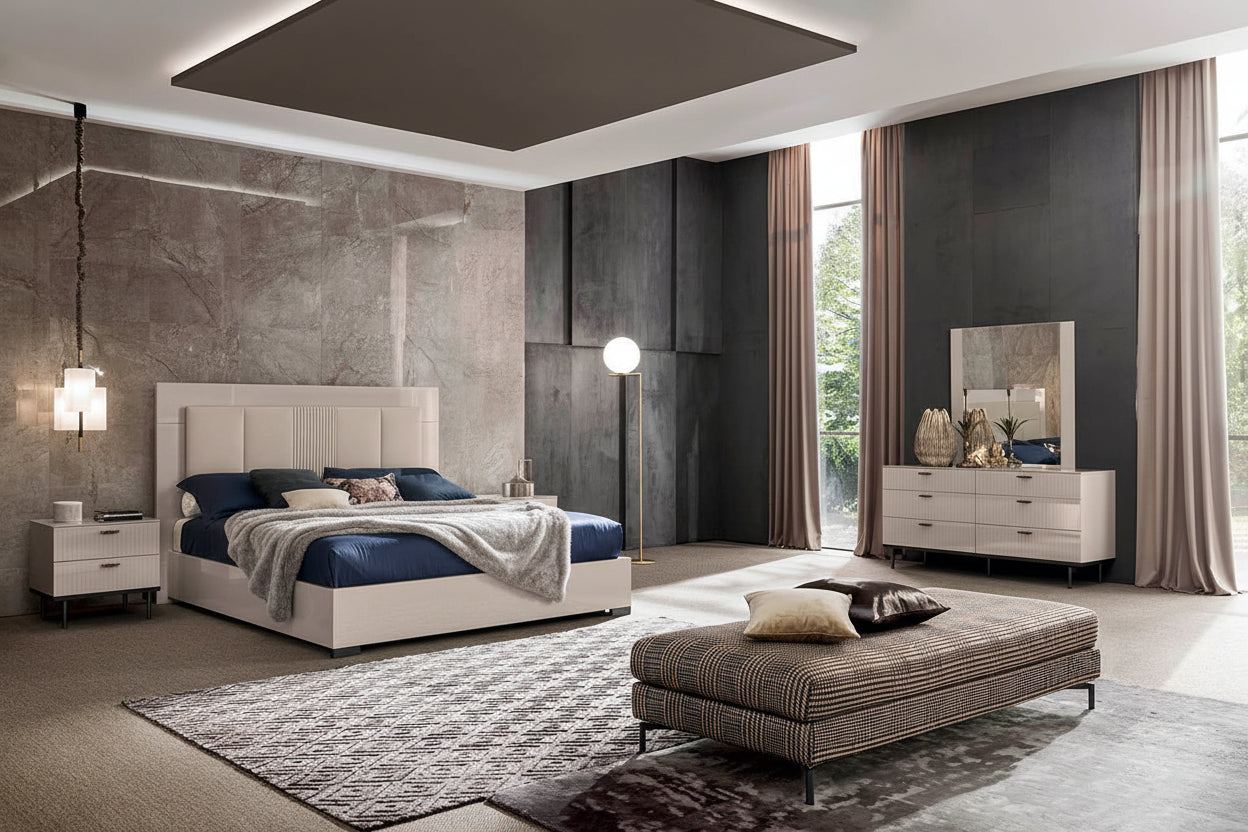 The Claire modern bedroom set with gray walls, a white bed, and a gray rug.