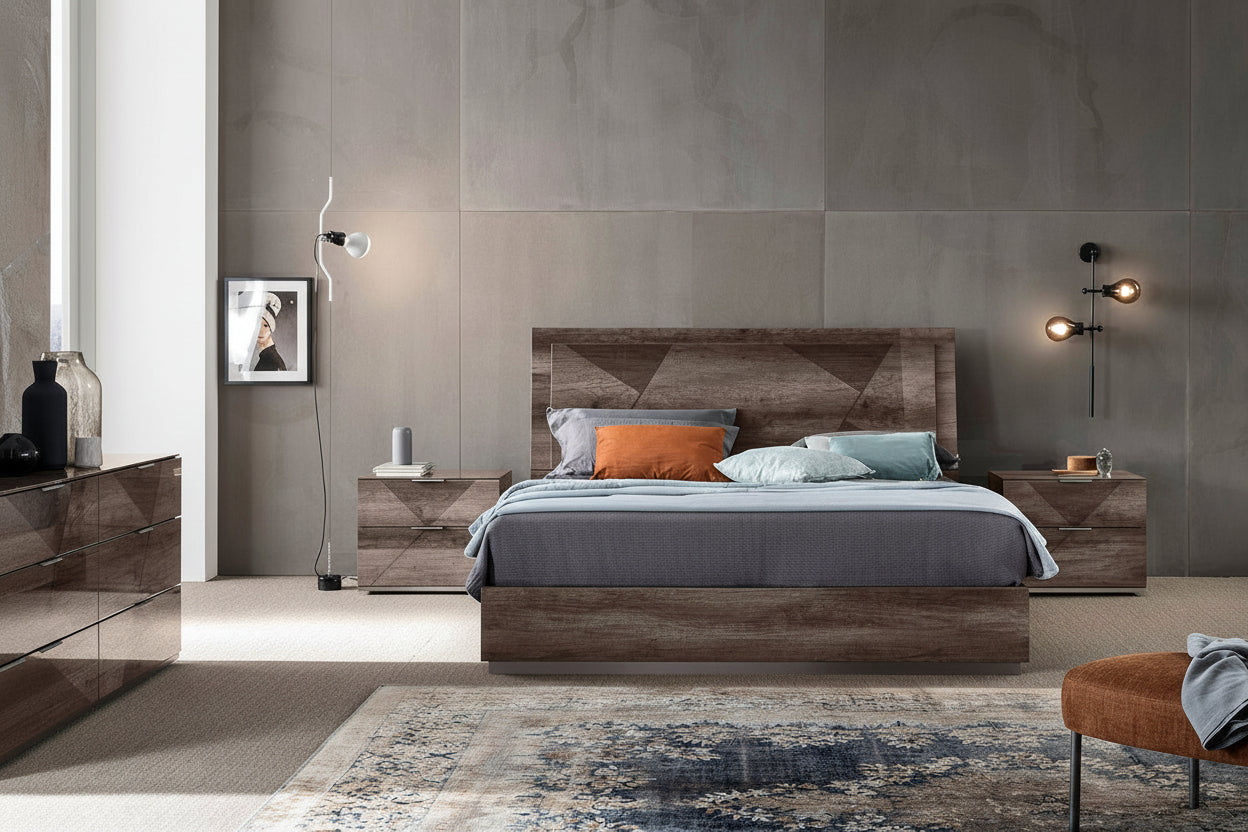 Favignan modern bed with matching nightstands against a gray wall.