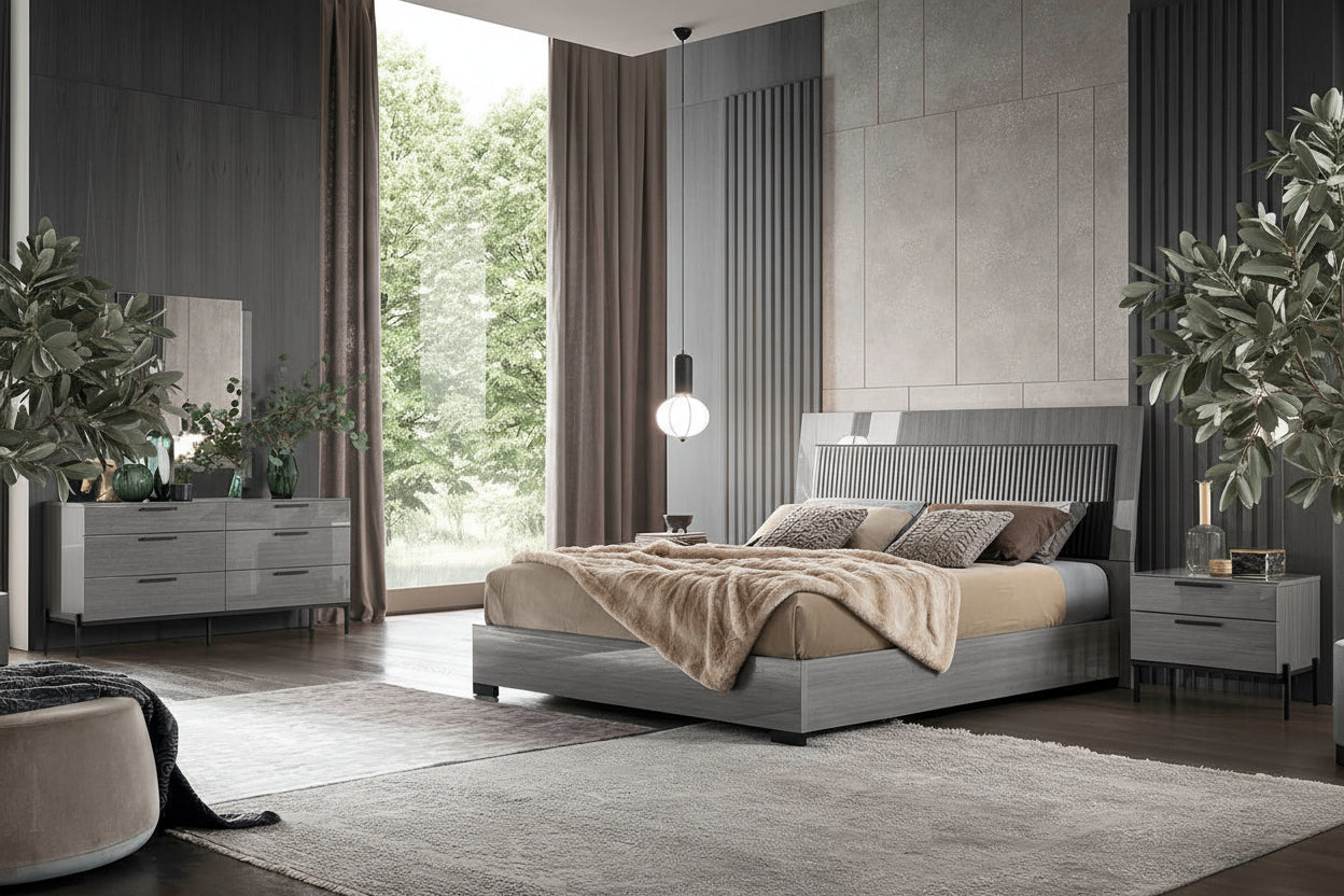 Novecento modern bedroom set with gray upholstered bed, nightstands, and decor.