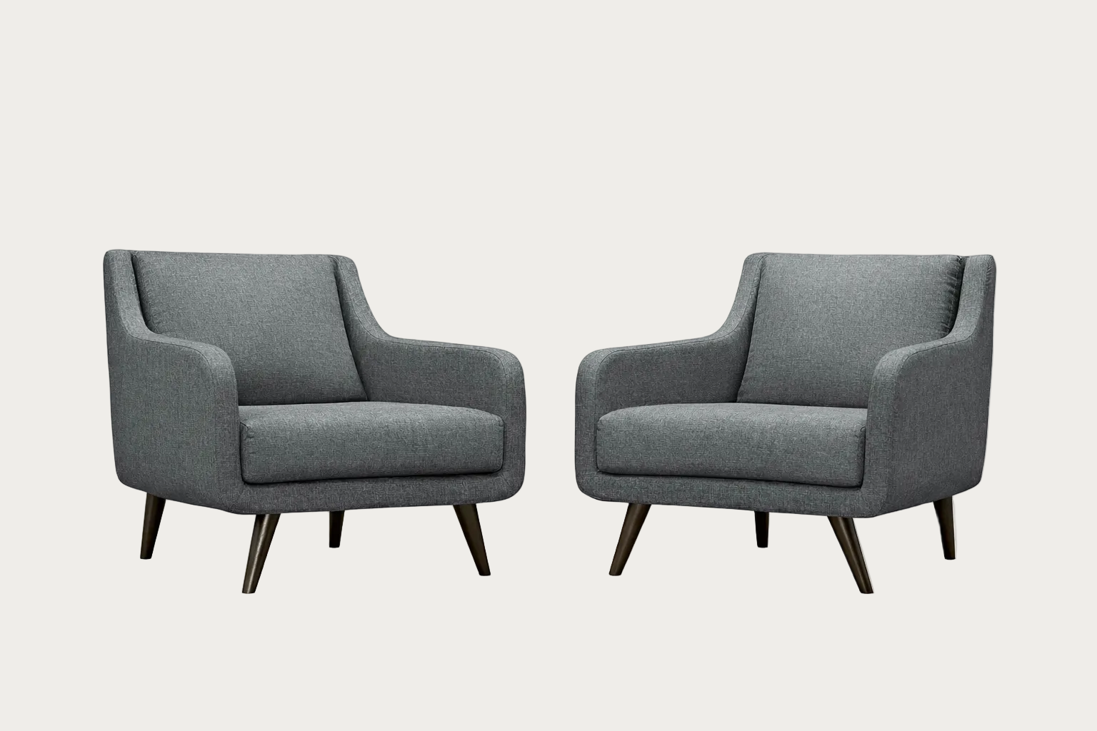 Two gray Verve armchairs on a white background.