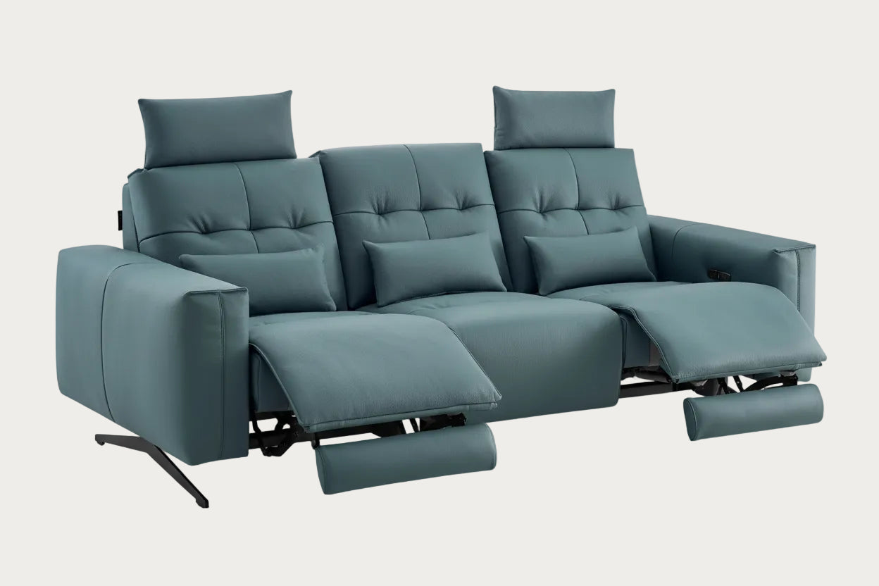Amalfi recliner sofa upholstered with green leather adjustable seats on a white background