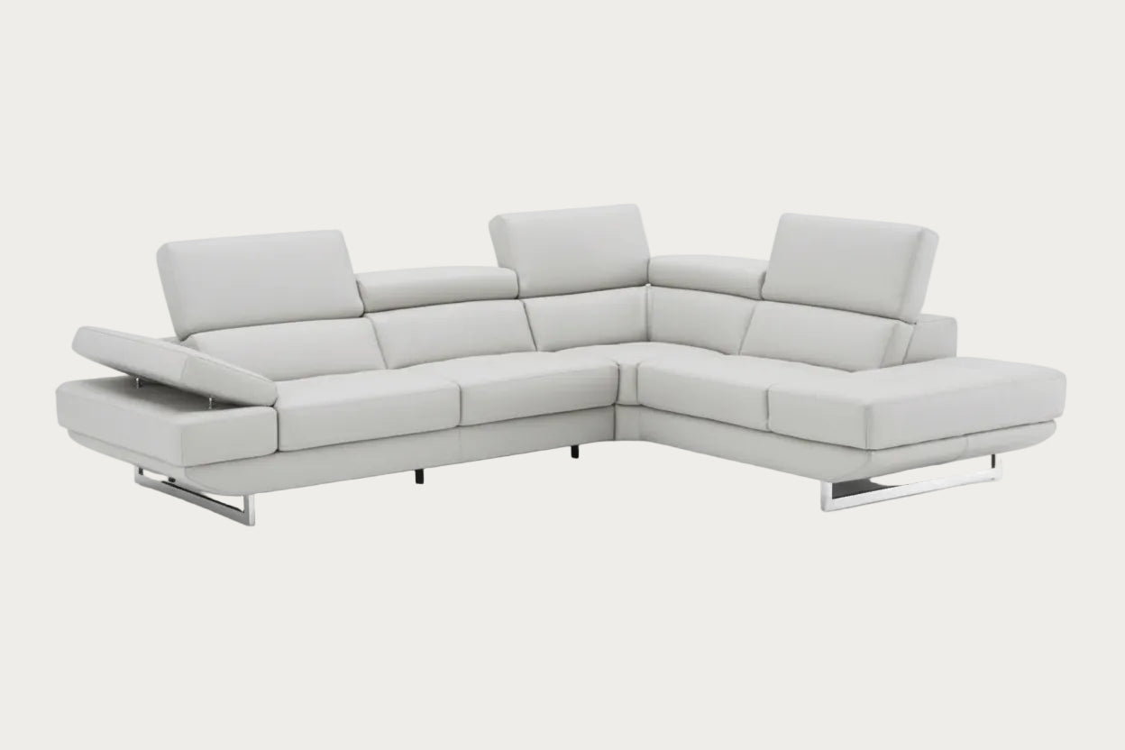 Gray sectional sofa with reclining feature on a white background