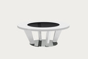 Ariana round coffee table with a white base and black glass top on a white background