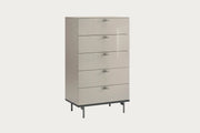 Claire beige chest with metal handles on a white background.