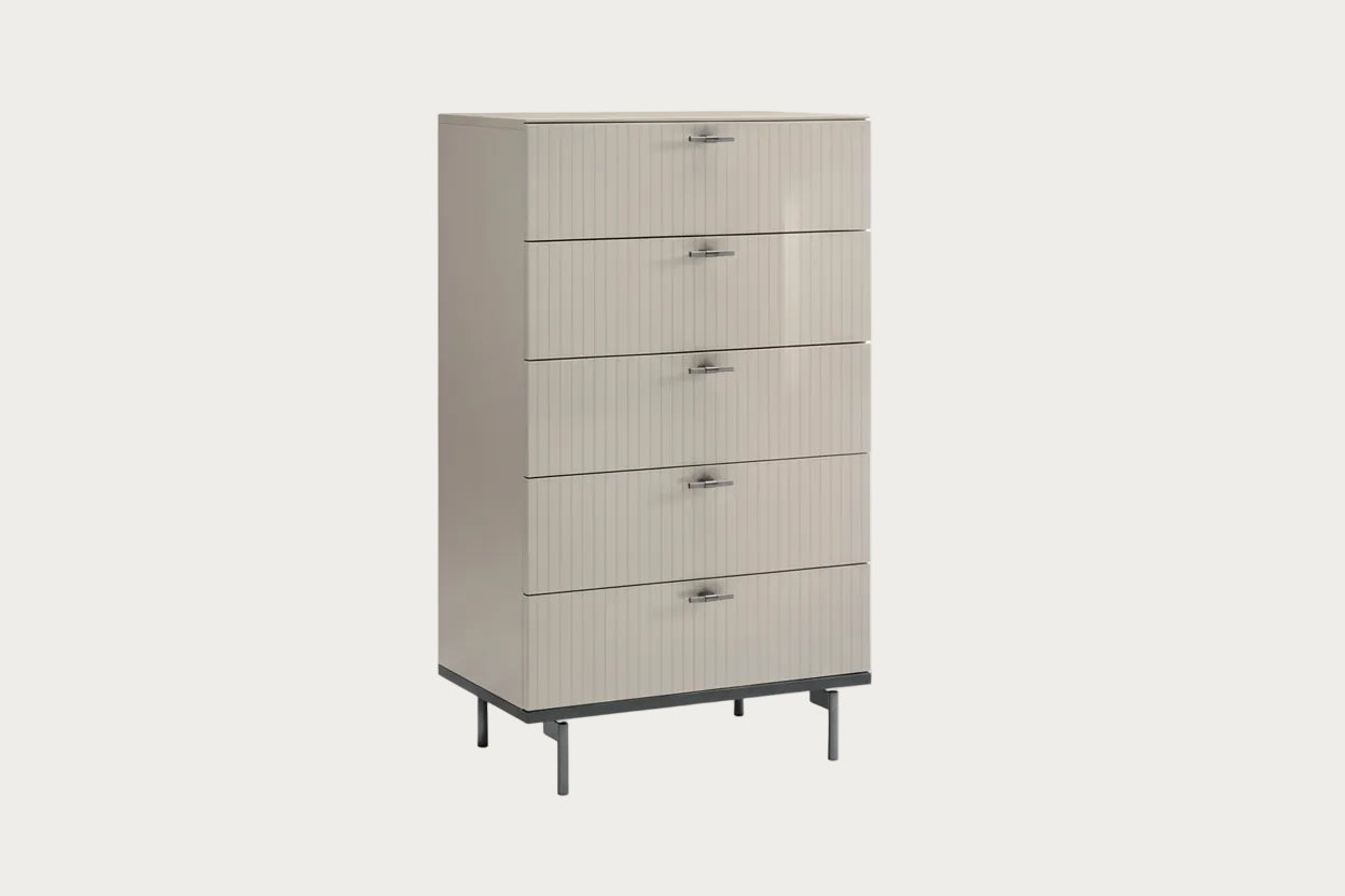 Claire beige chest with metal handles on a white background.