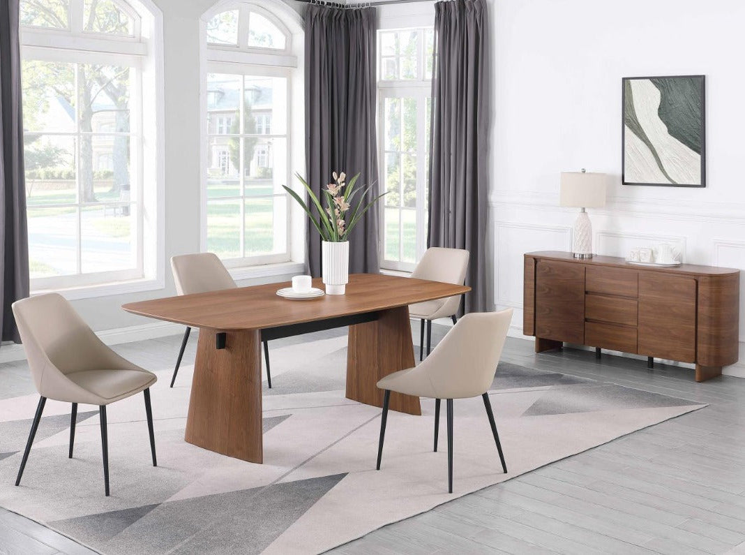 Eden dining room with wooden table and chairs in a well-lit room.