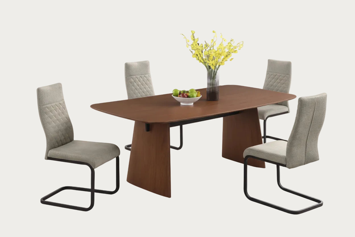 Dining room set with a wooden table and four chairs in a well-lit room.