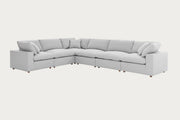 Light gray sectional sofa on a white background.