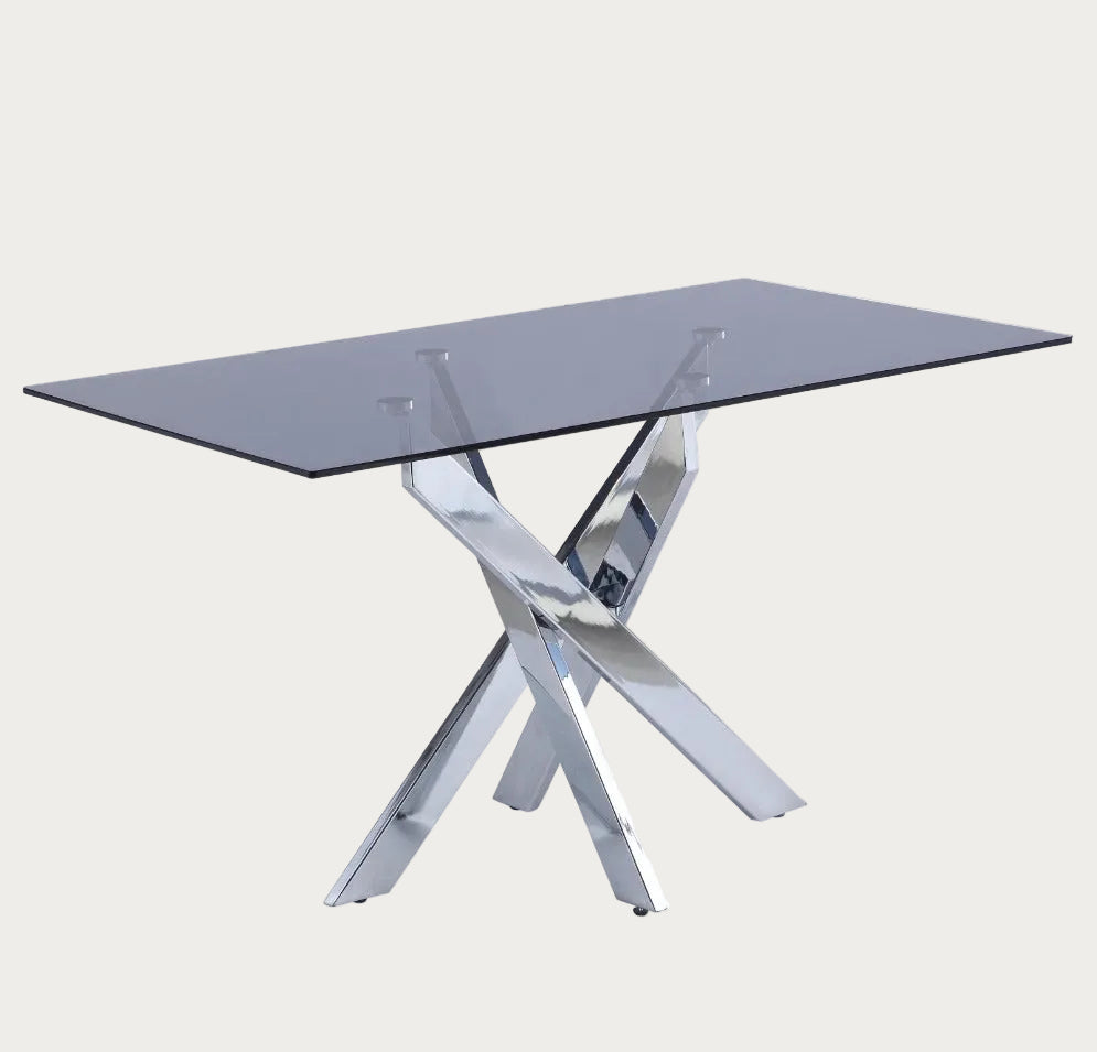 Genevieve glass dining table with metal base on a white background