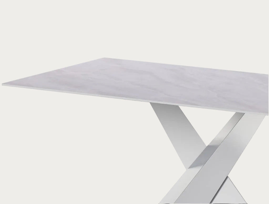 White dining table with a modern design on a white background