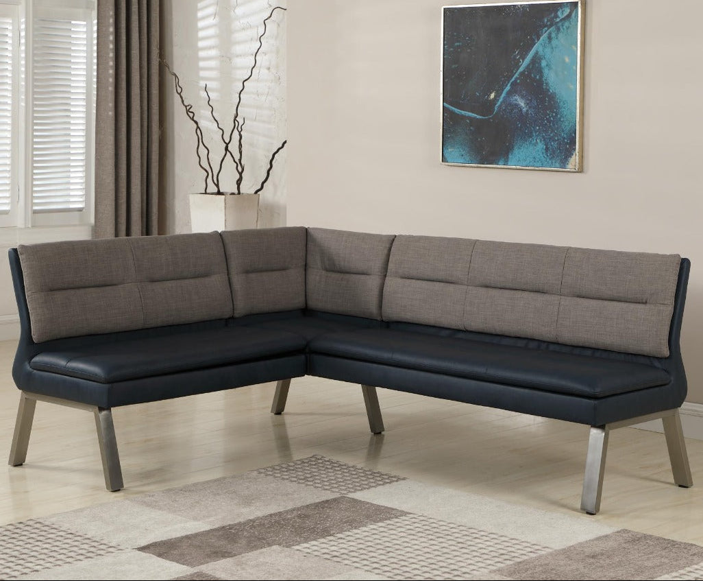 Jezebel gray and black nook in a living room setting with a painting on the wall.