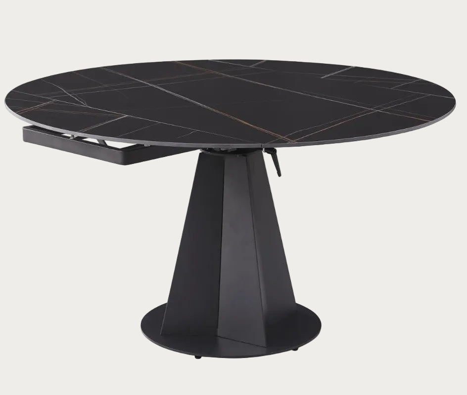 Jocelyn black round extendable dining table with a tiled surface on a white background