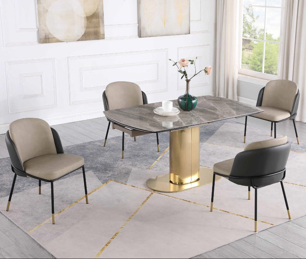 Karla Katherine dining room set with a modern table and chairs in a well-lit room.