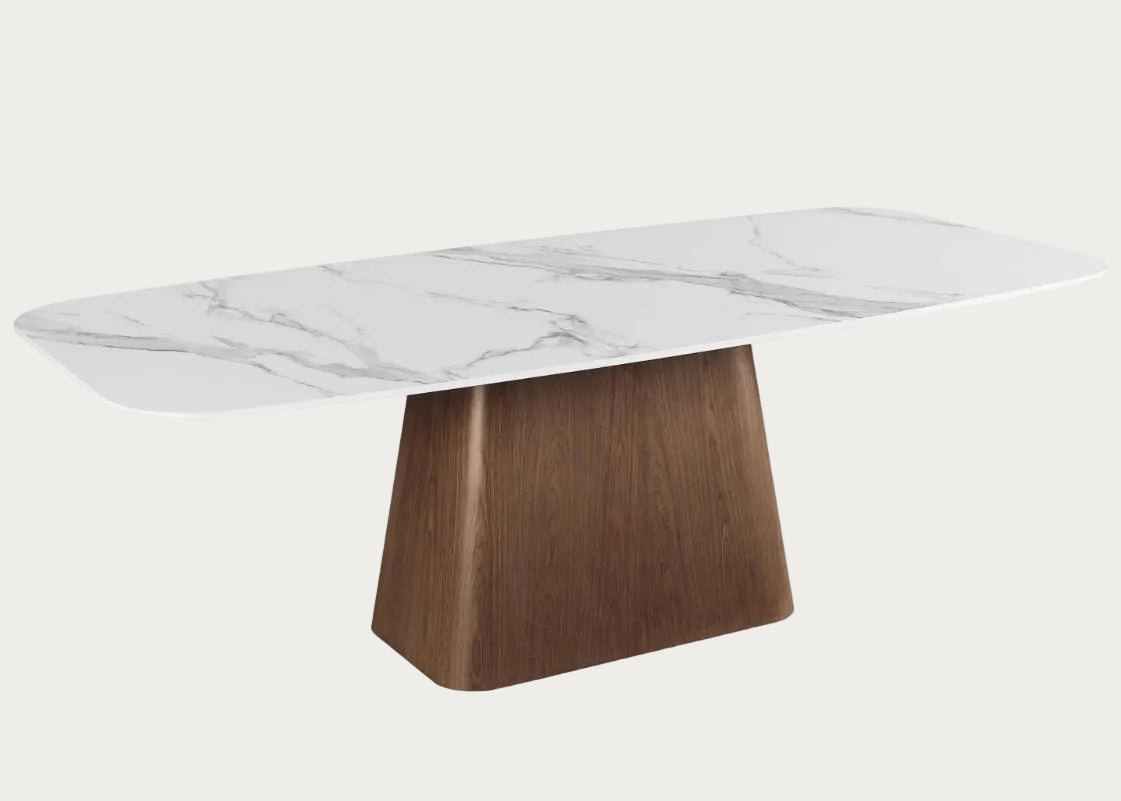 The Kenza dining table with marble top and wooden base.