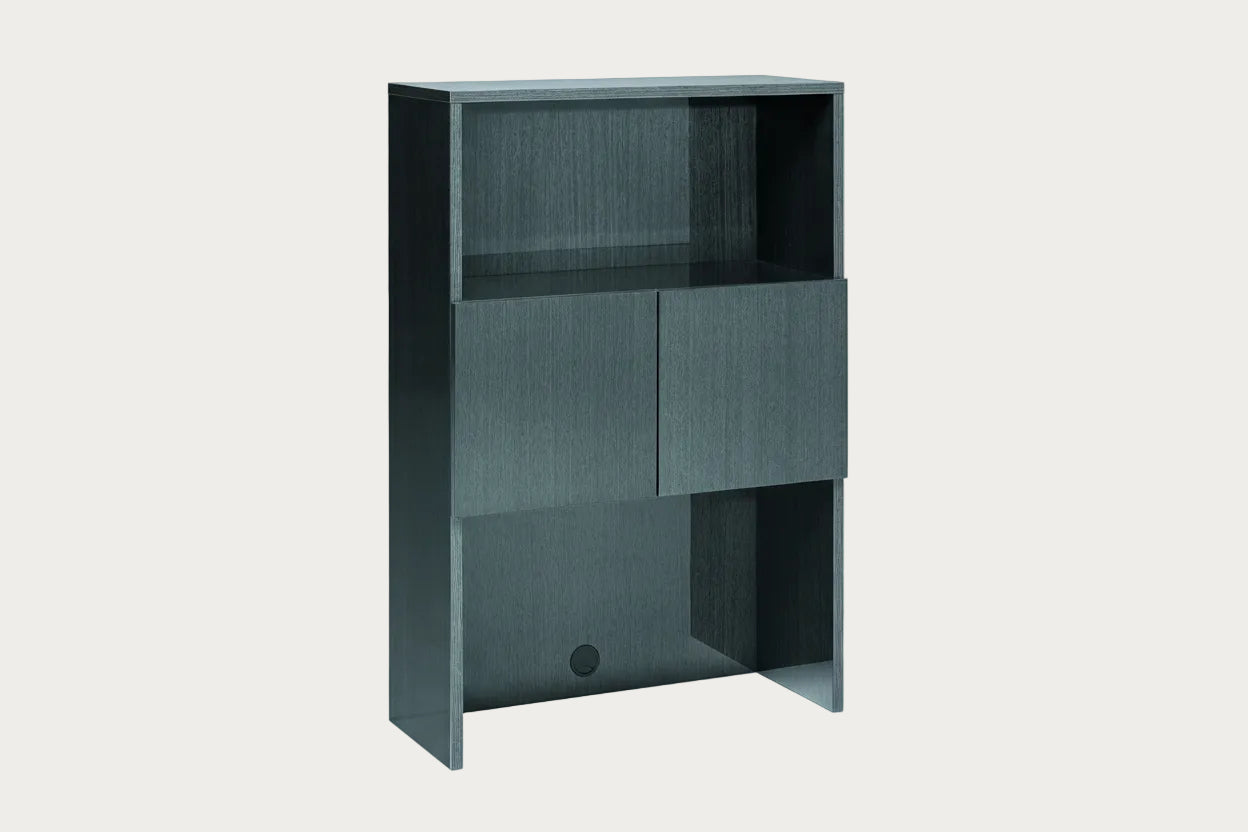 Montecarlo dark gray bookshelf with two shelves and a small drawer on a white background.