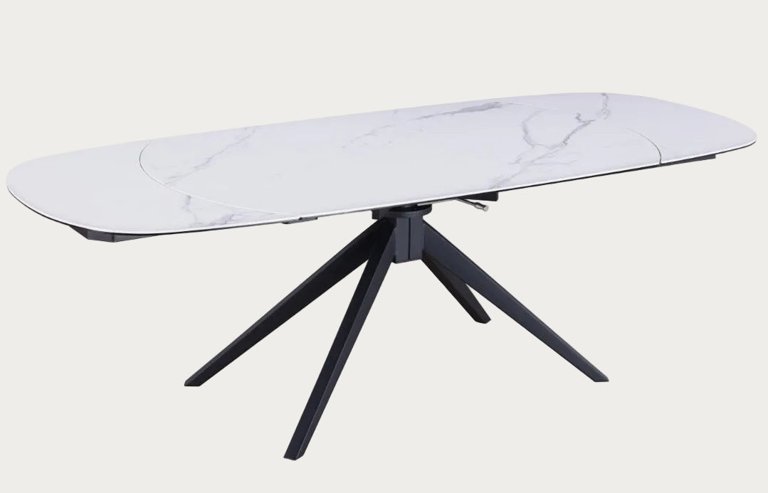 Nicole modern dining table with white marble-like top and black metal legs