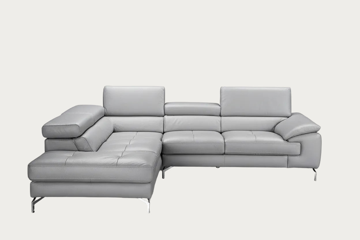 Olivia gray left facing chaise sectional sofa on a white background.