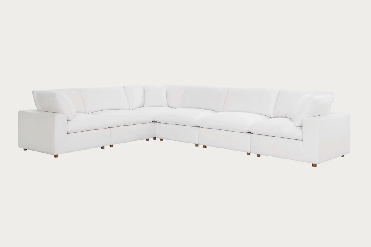 White sectional sofa on a white background